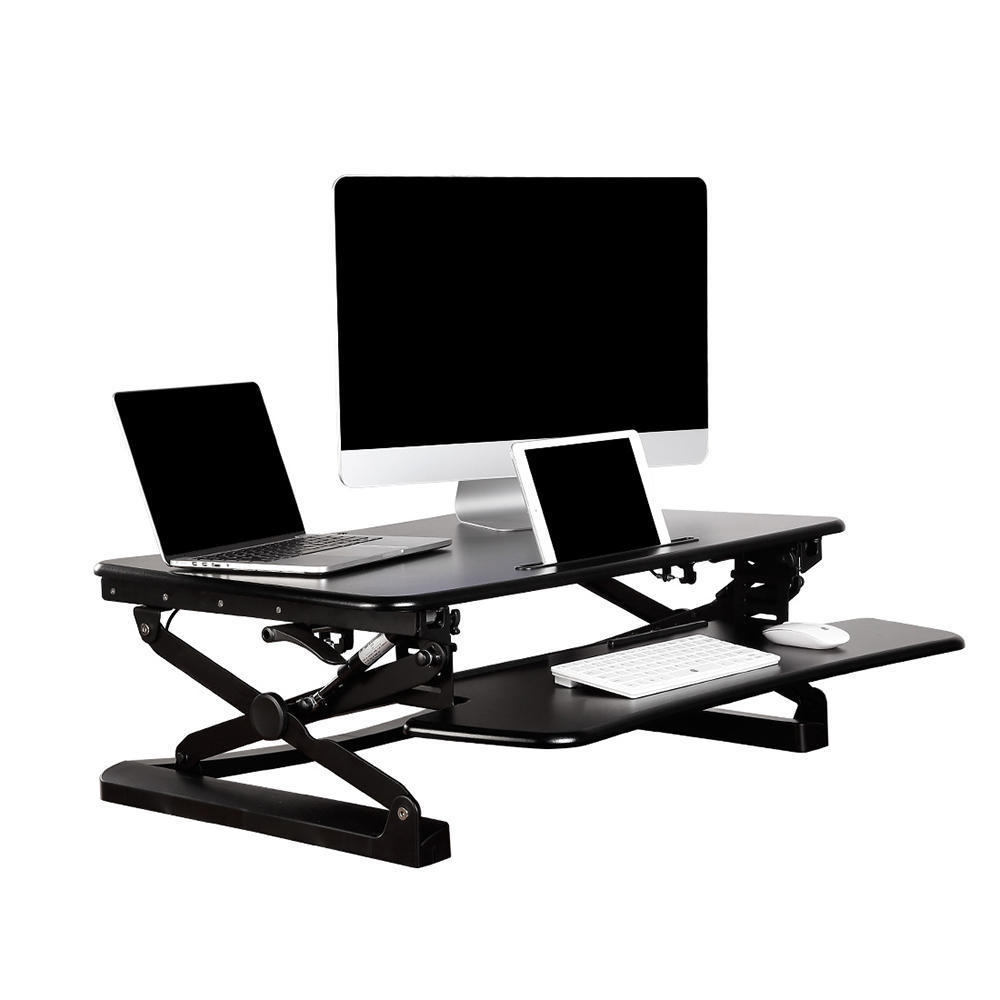 a black desk mount with a computer monitor, a laptop and a tablet on it 